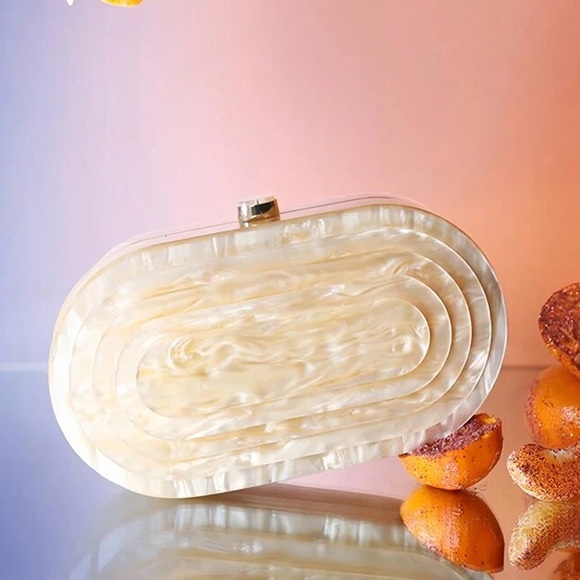 Handbags - Textured marbled clutch purse